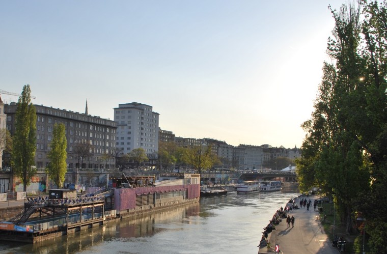 People enjoying the afternoon on the banks of the Danube Canal